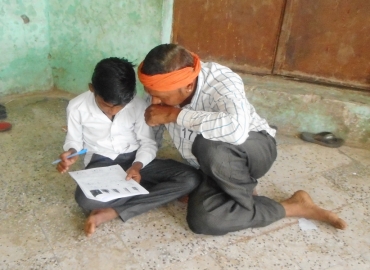 Written exam with dummy reader for illiterate candidate
